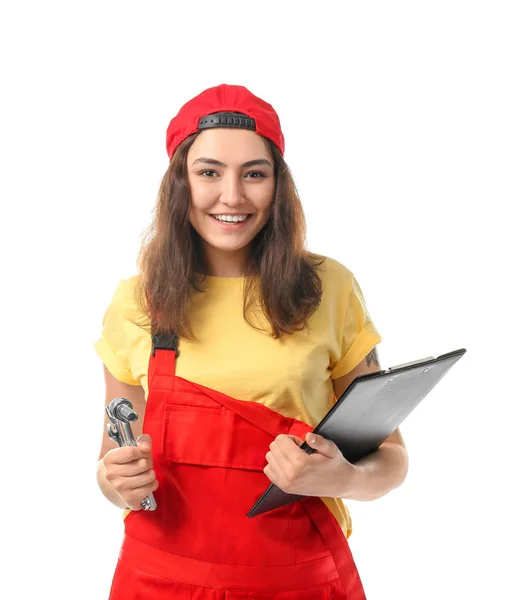 Meccanico donna in uniforme con appunti e strumenti su fondo bianco — Foto Stock