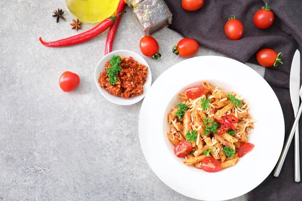 Composition with tasty penne pasta on table — Stock Photo, Image