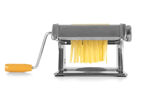 Metal pasta machine with dough on white background — Stock Photo, Image