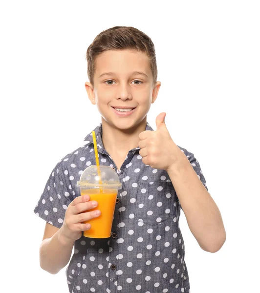 Rolig liten pojke med citrusjuice på vit bakgrund — Stockfoto