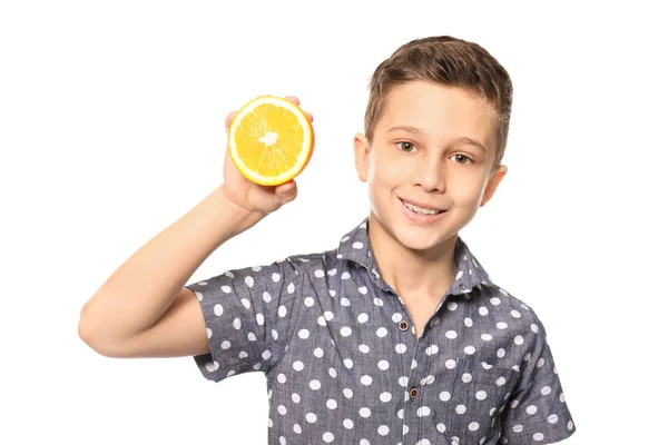 Niño divertido con cítricos sobre fondo blanco — Foto de Stock