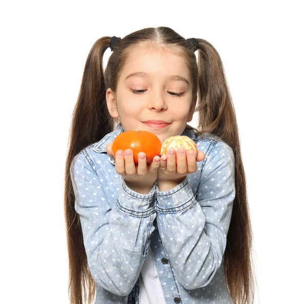 Funny little girl with citrus fruit on white background — Stock Photo, Image