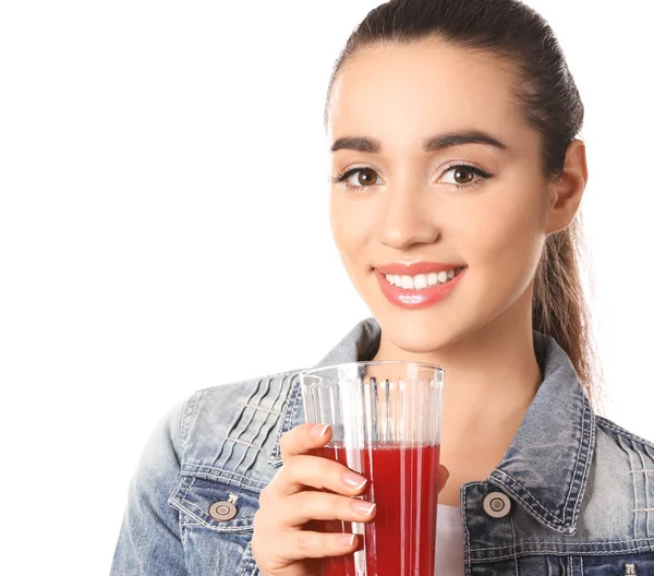 Beautiful young woman with glass of citrus juice on white background — Stock Photo, Image