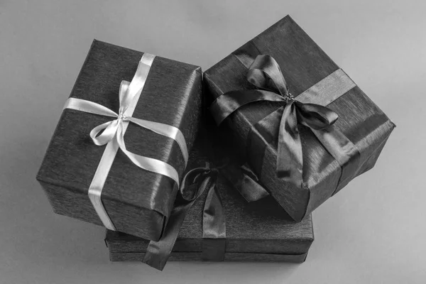 Elegant gift boxes on gray background — Stock Photo, Image