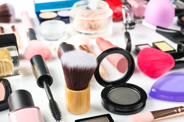 Decorative cosmetics on white table — Stock Photo, Image