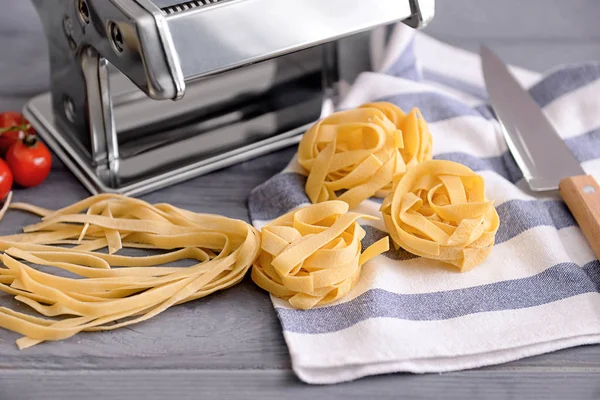 Raw pasta on table — Stock Photo, Image