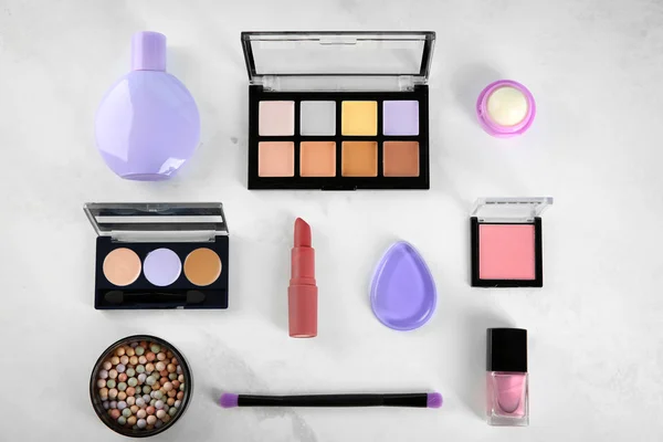 Flat lay composition with decorative cosmetics on table — Stock Photo, Image