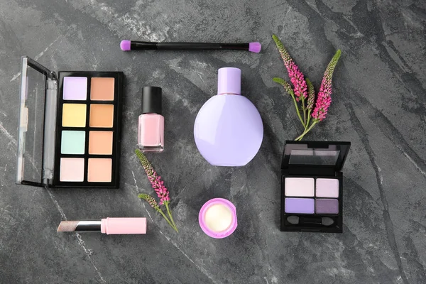 Flat lay composition with cosmetic products on grey background — Stock Photo, Image