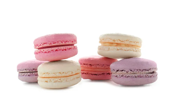 Tasty colorful macarons on white background — Stock Photo, Image