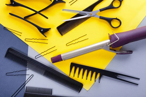 Flat lay composition with set of hairdresser's tools on color background — Stock Photo, Image