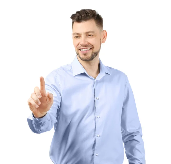 Young businessman using virtual screen on white background — Stock Photo, Image