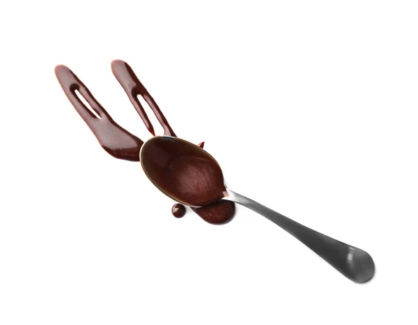 Colher e chocolate fundido no fundo branco — Fotografia de Stock