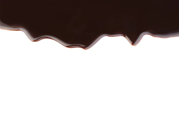 Pyszny sos czekoladowy na białym tle — Zdjęcie stockowe