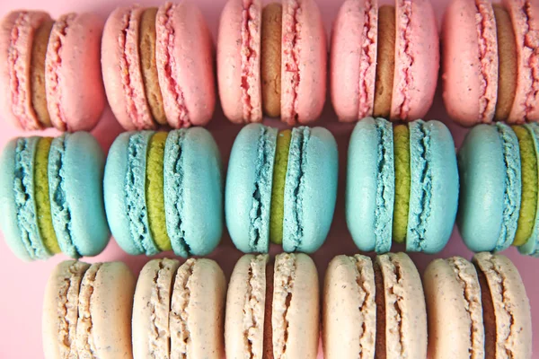 Many delicious macarons, top view — Stock Photo, Image
