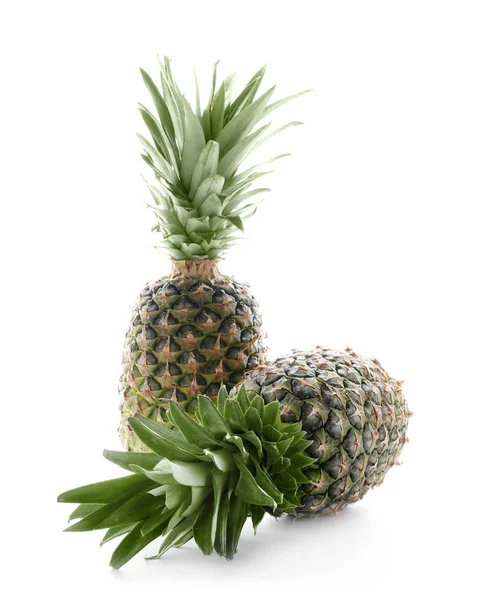 Tasty pineapples on white background — Stock Photo, Image