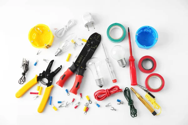 Electrician's supplies on white background Stock Photo