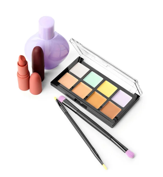 Set of decorative cosmetics with brushes on white background — Stock Photo, Image