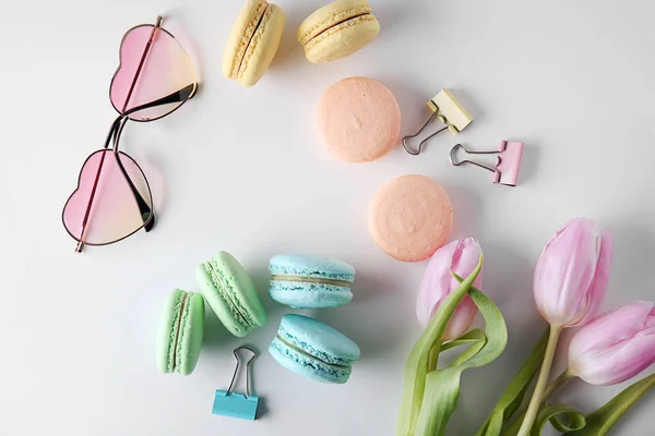 Composition with tasty colorful macarons on white background — Stock Photo, Image