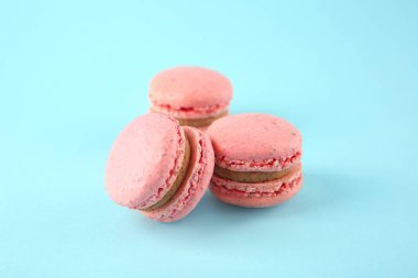Lezzetli macarons renk arka plan üzerinde