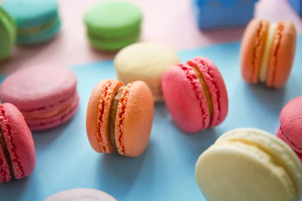 Tasty macarons on color background — Stock Photo, Image