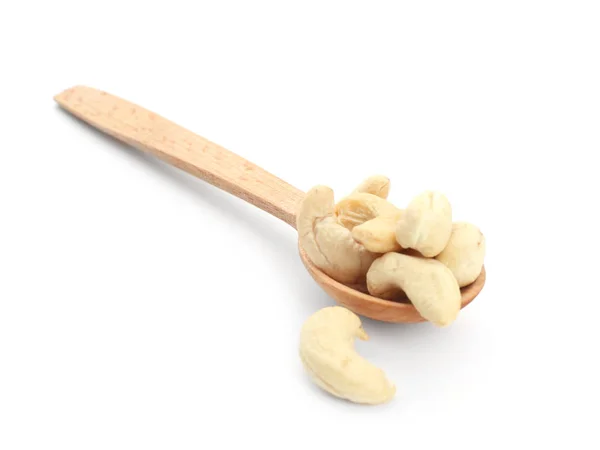 Wooden spoon with tasty cashew nuts on white background — Stock Photo, Image