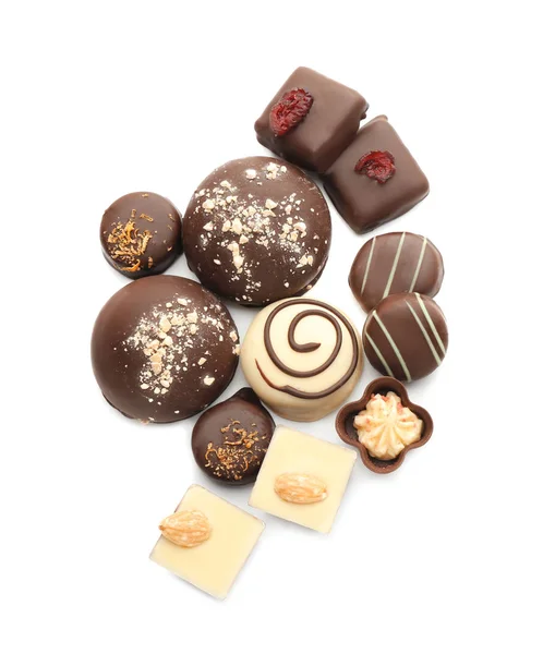 Tasty chocolate candies on white background — Stock Photo, Image