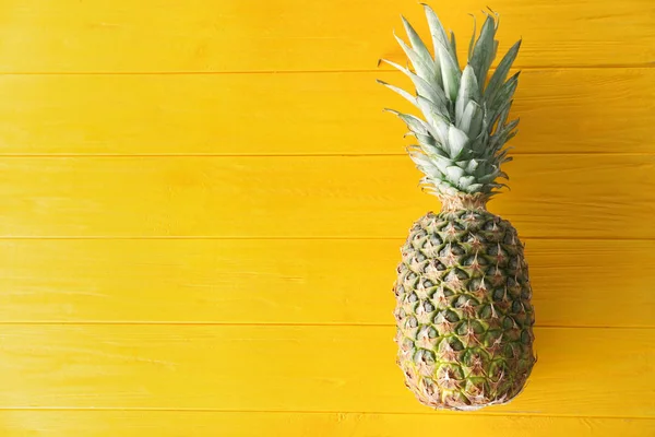 Tasty pineapple on wooden background — Stock Photo, Image