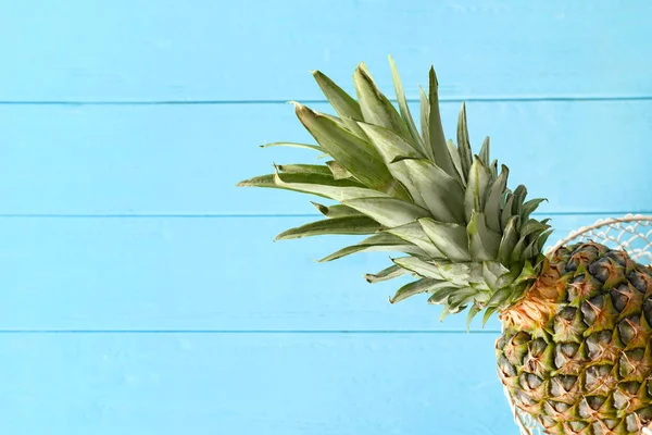 Tasty pineapple on wooden table — Stock Photo, Image