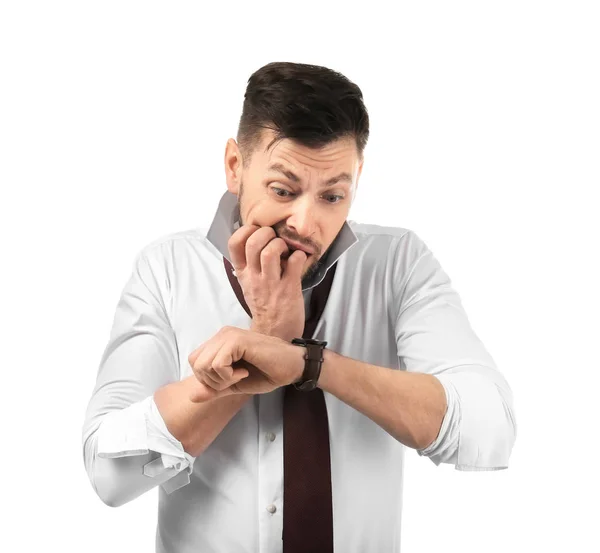 Businessman looking at his watch on white background. Time management concept — Stock Photo, Image