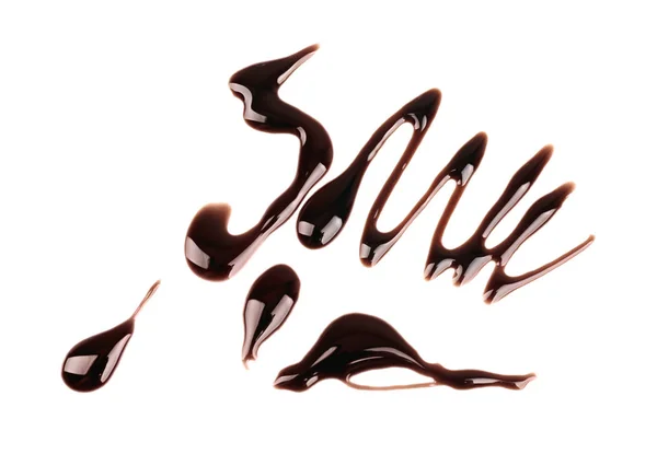 白色背景巧克力糖浆图案 — 图库照片