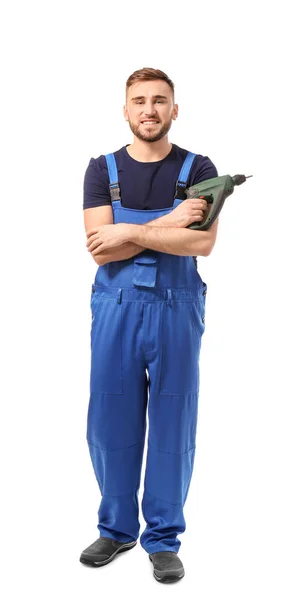 Male car mechanic with drill on white background — Stock Photo, Image