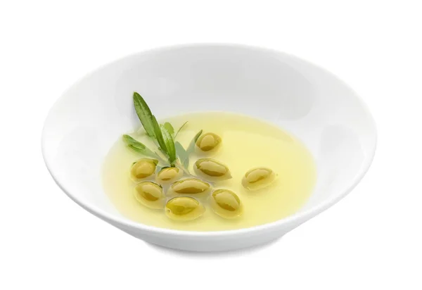 Bowl with oil and canned olives on white background — Stock Photo, Image