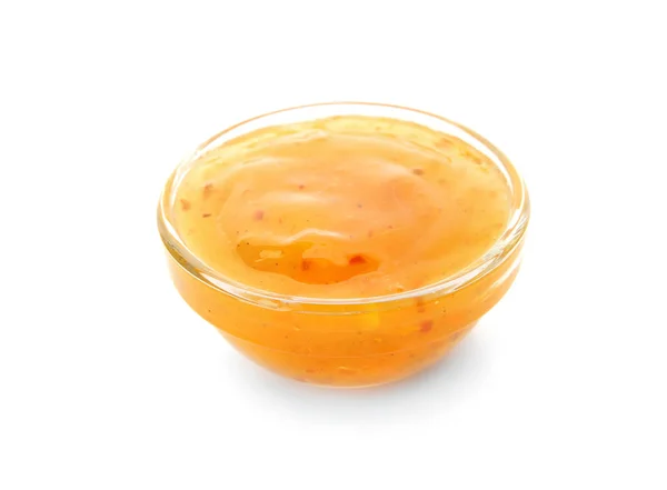 Glass bowl with tasty sauce on white background — Stock Photo, Image