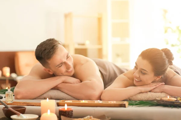 Young couple relaxing in spa salon