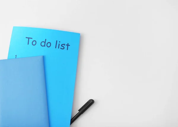 Empty to-do list with notebook on white background — Stock Photo, Image