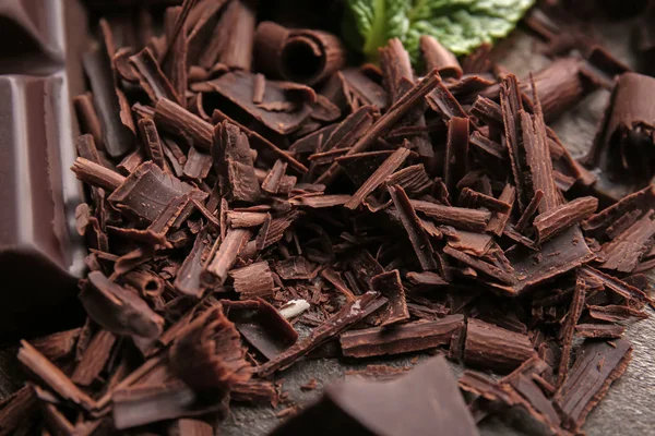 Chocolate curls on table, closeup