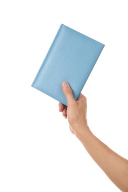 Beyaz arka plan üzerinde kitapla erkek el