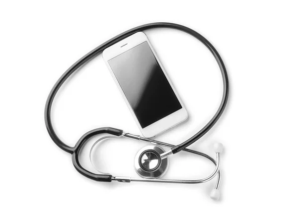 Stethoscope with phone on white background. Health care concept — Stock Photo, Image