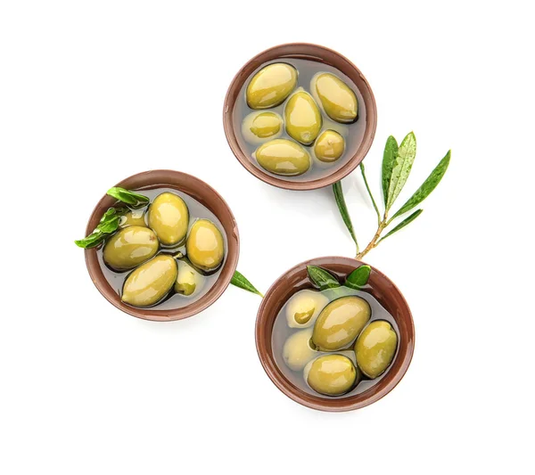 Bowls with canned olives on white background — Stock Photo, Image