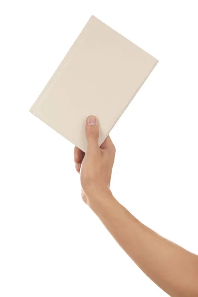 Mano maschile con libro su sfondo bianco — Foto Stock