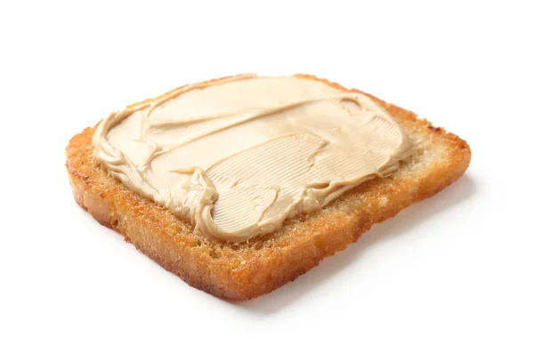 Delicious toast with peanut butter on white background — Stock Photo, Image