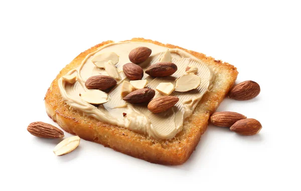 Delicious toast with peanut butter and almonds on white background — Stock Photo, Image