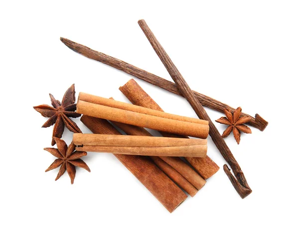 Cinnamon sticks, vanilla pods and anise stars on white background — Stock Photo, Image