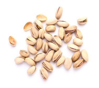 Beyaz zemin üzerine lezzetli fıstık fındık