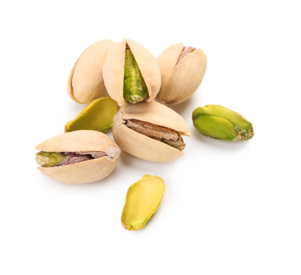 Sabrosas nueces de pistacho sobre fondo blanco —  Fotos de Stock