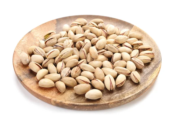 Plate with tasty pistachio nuts on white background — Stock Photo, Image