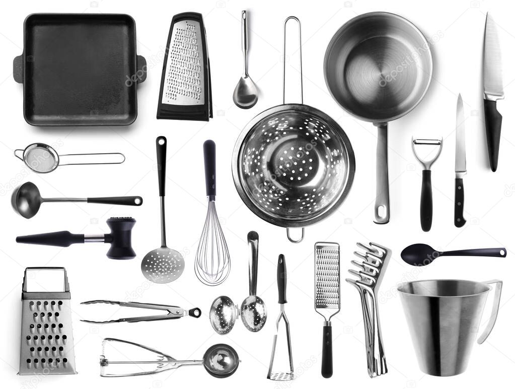 Set of metal kitchen utensils on white background
