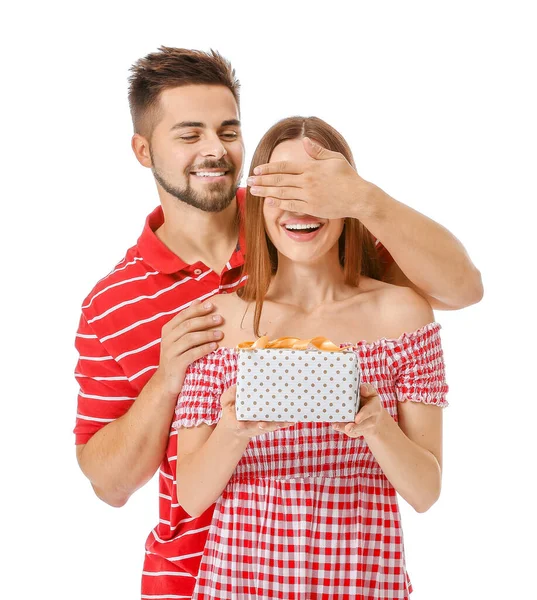 Feliz homem cumprimentando sua namorada no fundo branco — Fotografia de Stock