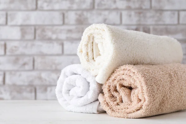 Soft clean towels on table — Stock Photo, Image