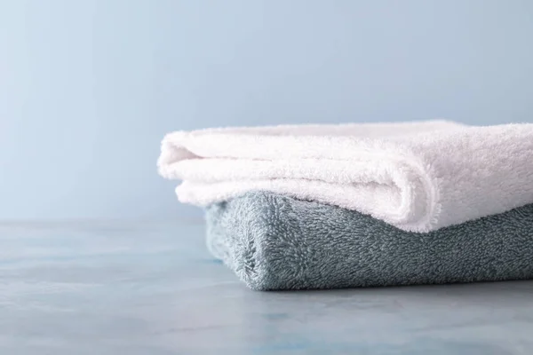 Soft clean towels on color background — Stock Photo, Image